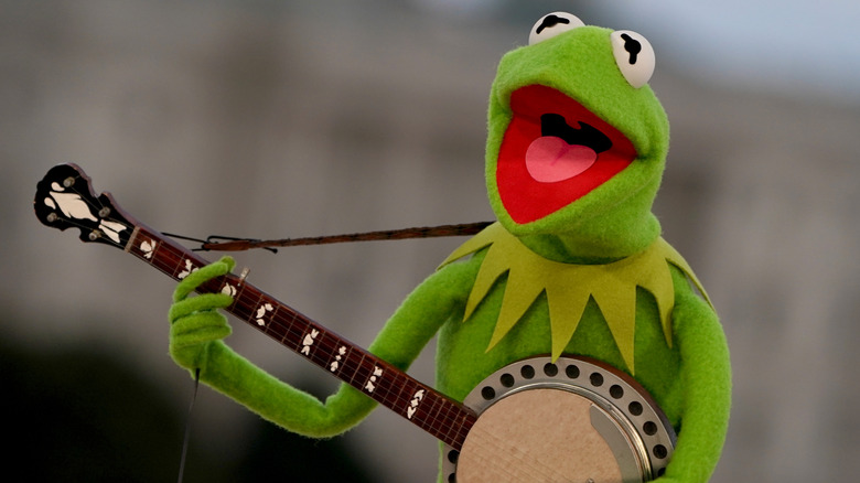 Kermit the frog playing his banjo