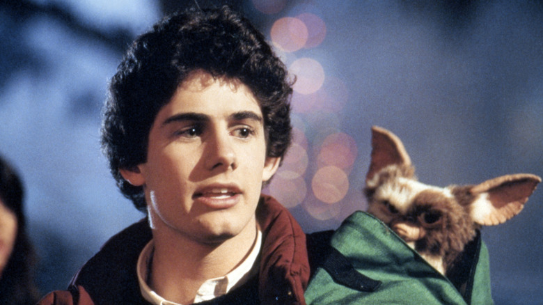Zach Galligan and Gizmo star in the film 'Gremlins'