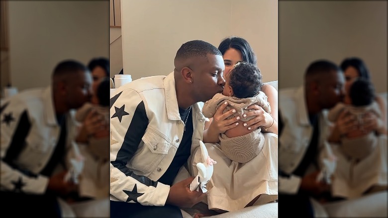 Matt Sallee giving his daughter Maliyah a kiss in 2024
