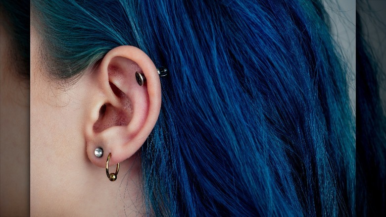 Two earlobe piercings