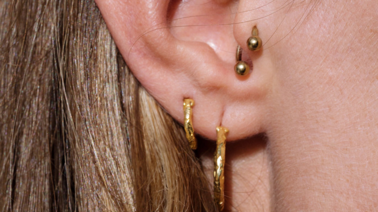 High-low lobe earring piercing