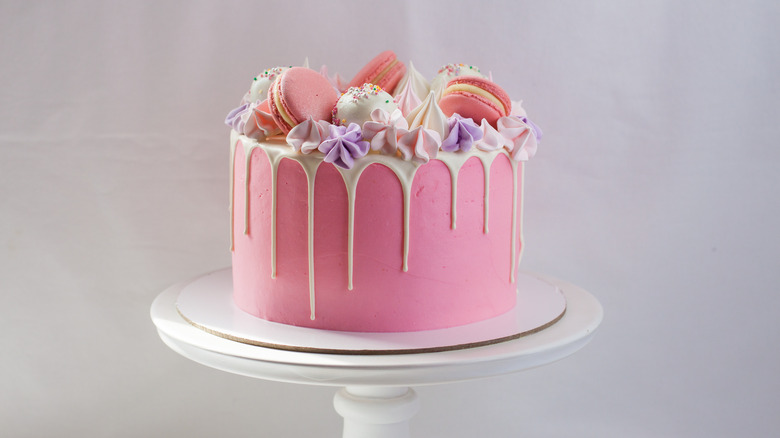 pink wedding cake on display