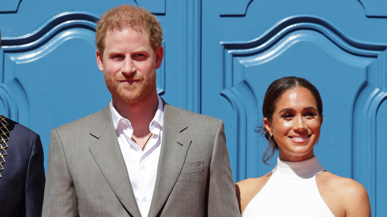 Meghan Markle posing with Prince Harry