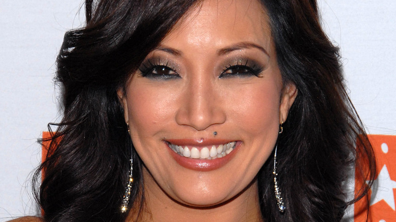 Carrie Ann Inaba smiling at an event