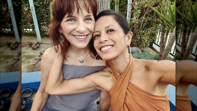 Amielynn Abellera with her arm around partner Anastasia Coon.