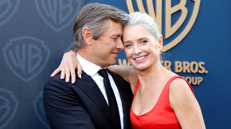 Grant Show with his forehead against Katherine LaNasa's.