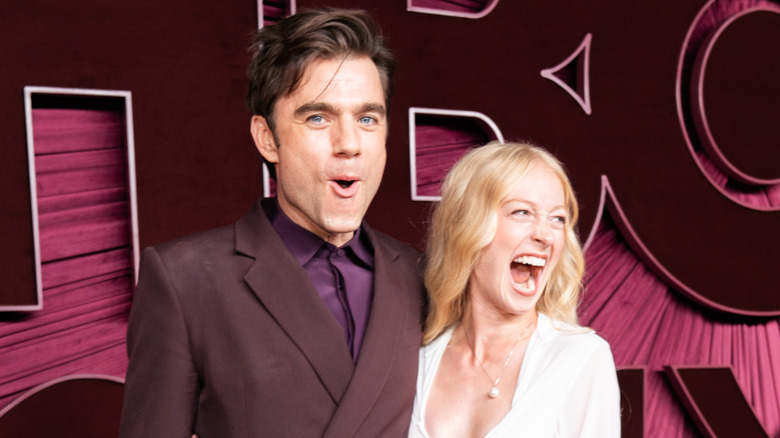 Patrick Ball making a silly face with Elysia Roorbach who appears to be in mid laugh.