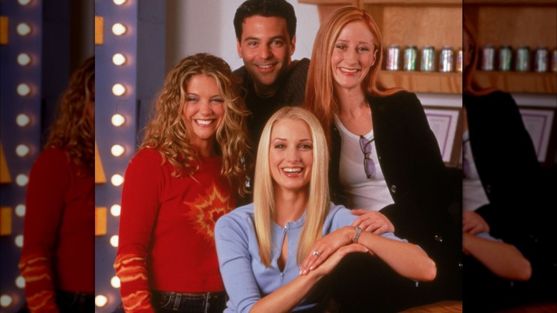 Katherine LaNasa, A.J. Langer, David Alan, and Vicki Lewis smiling at "Three Sisters" photoshoot