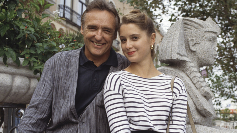 Katherine LaNasa and Dennis Hopper smiling in 1989