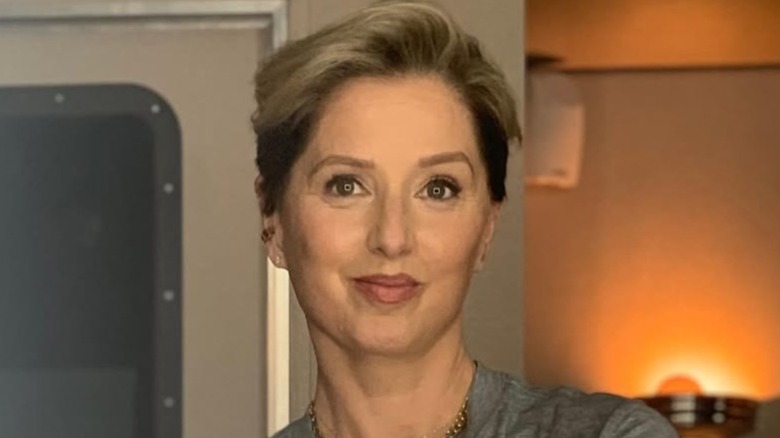 Katherine LaNasa smiles in a selfie