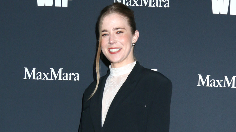 Taylor Dearden posing on step-and-repeat