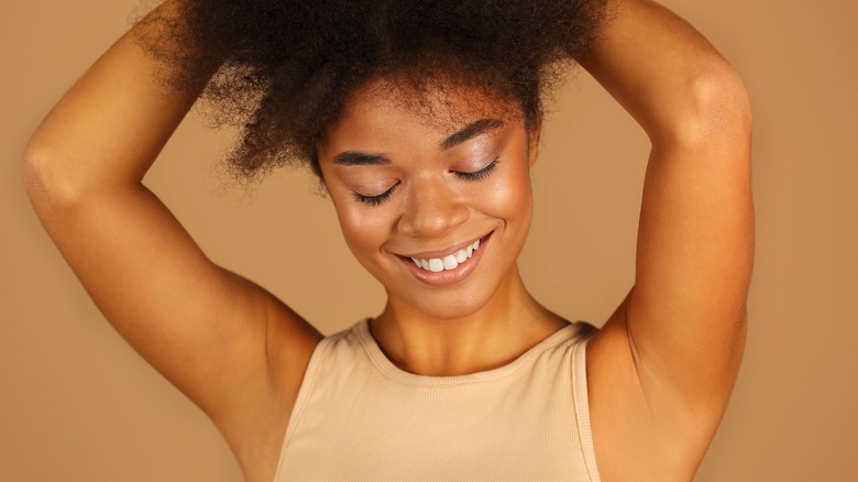 Girl shows off underarms