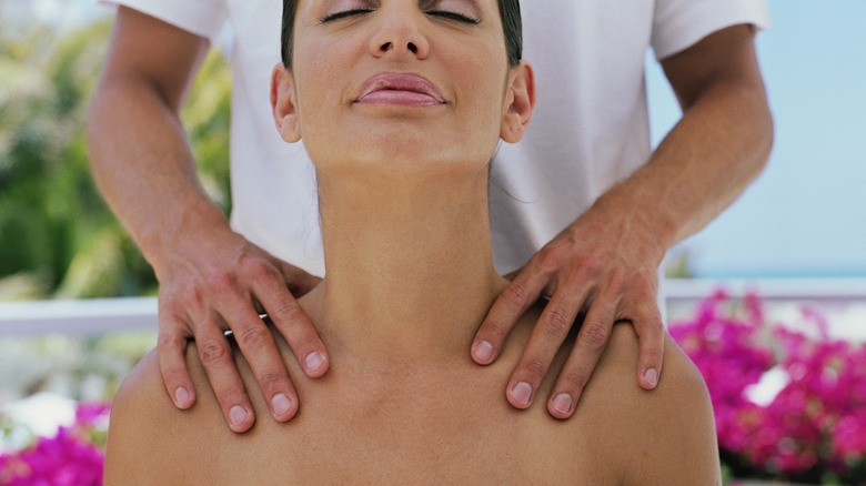 Woman receives massage
