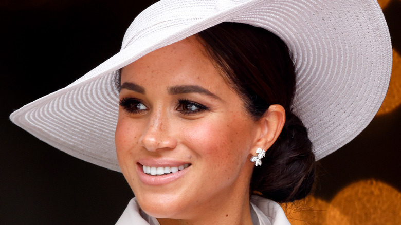 Meghan Markle wearing white hat