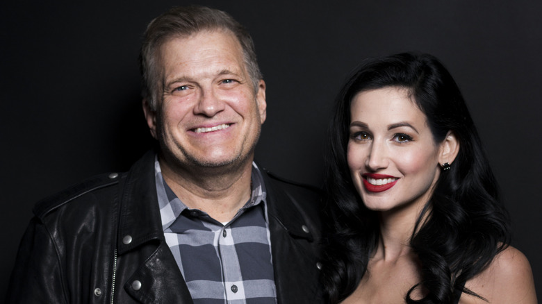 Drew Carey and Amie Harwick pose for an event at The Avalon in Hollywood in December 2017