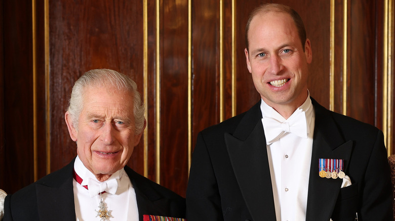 King Charles III next to Prince William