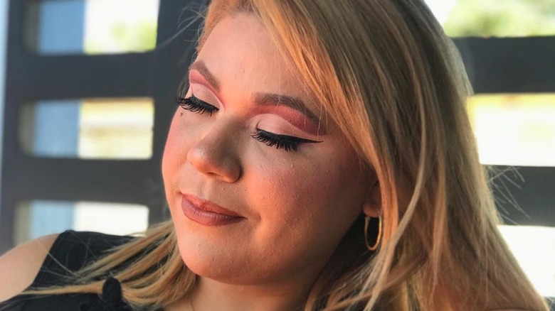 Woman with cut crease eyeshadow