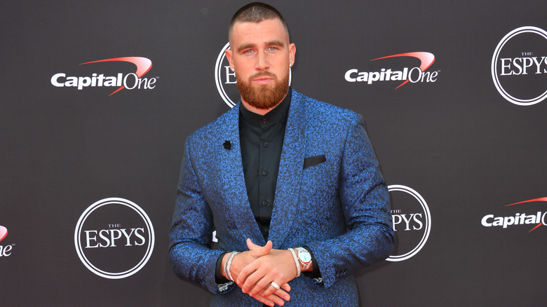 Travis Kelce posing at the Espys