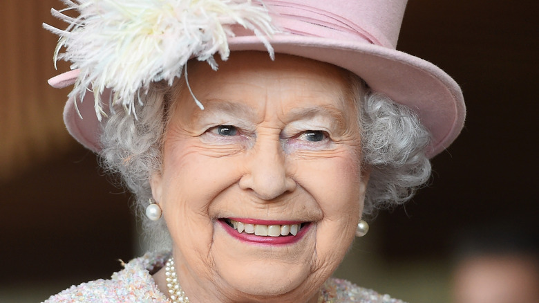 Queen Elizabeth, pale pink hat