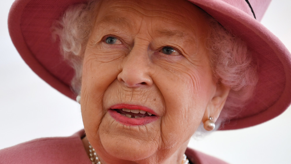 Queen Elizabeth II in pink hat