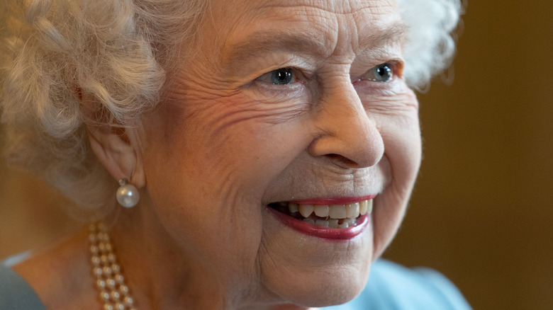 Queen Elizabeth II smiling at an event