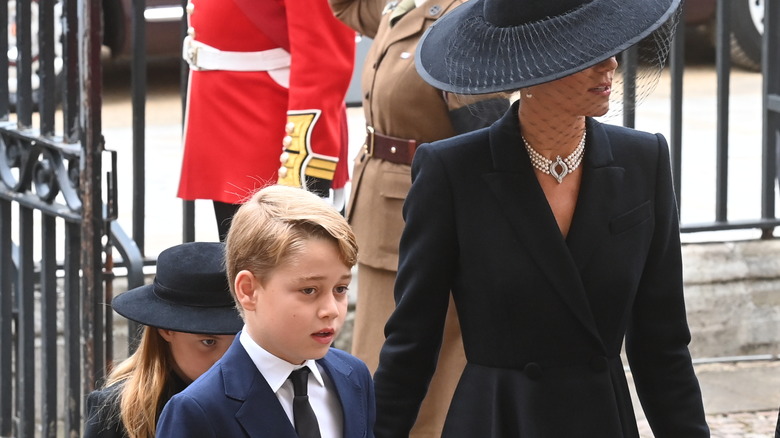 Princess Charlotte, Prince George and Catherine Middleton at queen's funeral