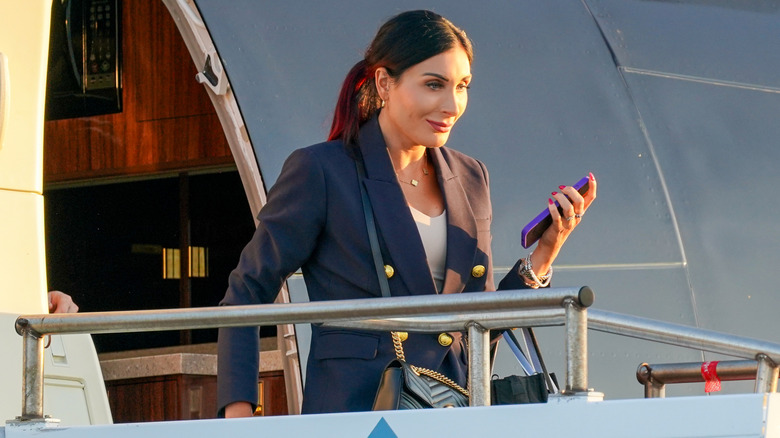 Laura Loomer exiting a jet