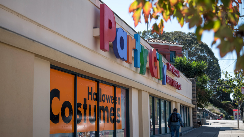 halloween costume sign at party city