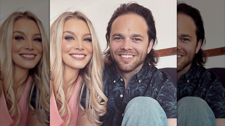 Actor Emily Maddison smiles in a selfie next to her husband Charlie Marsh