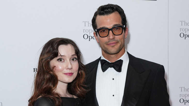 Syd Widziszewski-Kelly and Paul Anthony Kelly in black formalwear