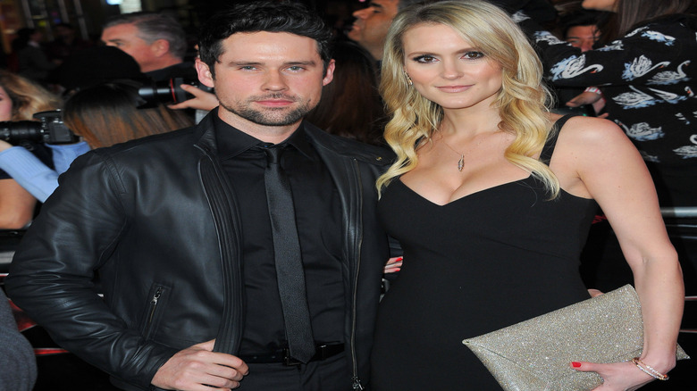 Benjamin Hollingsworth and Nila Myers pose for a photo