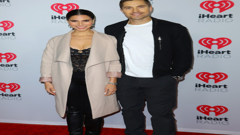 Eric Winter and Roselyn Sanchez smiling