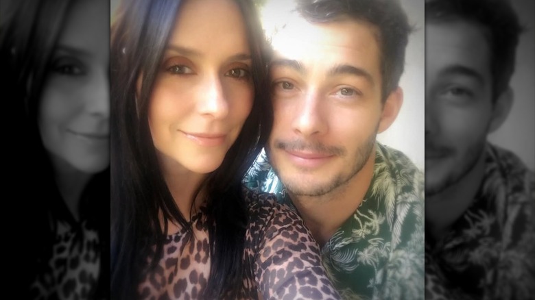 Jennifer Love Hewitt and Brian Hallisay posing for a photo together