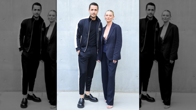 Jonah Hauer-King and Ellie Fenn at an Emporio Armani fashion show in Milan
