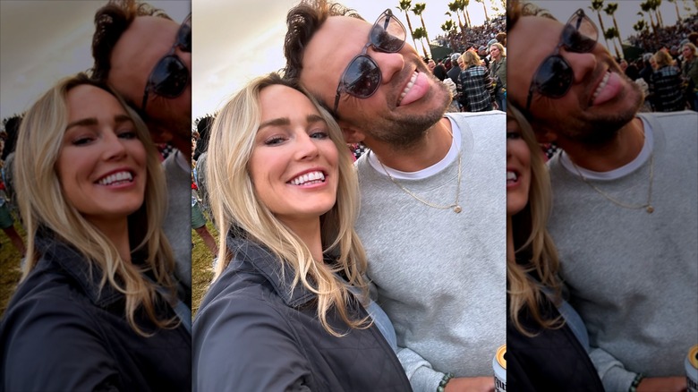 Caity Lotz taking a selfie with husband, Kyle Schmid.