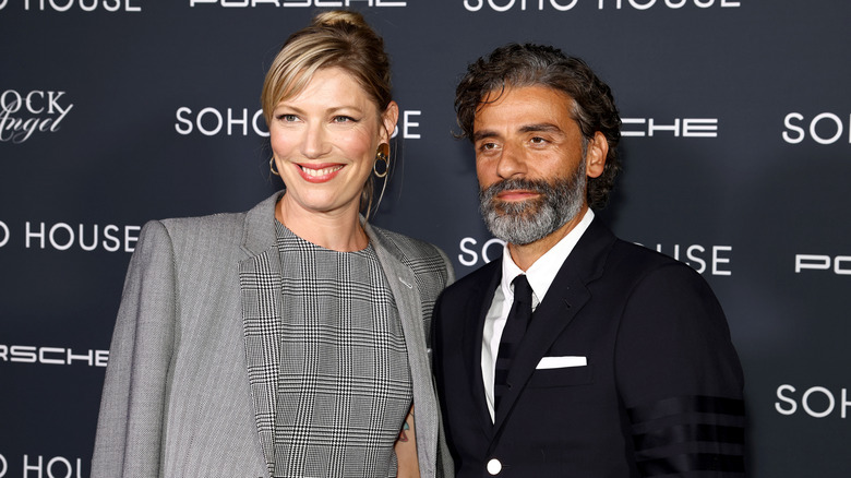 Oscar Isaac and Elvira Lind smiling