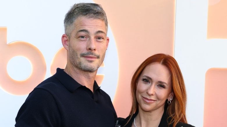 Brian Hallisay and Jennifer Love Hewitt on an ABC step and repeat in 2025