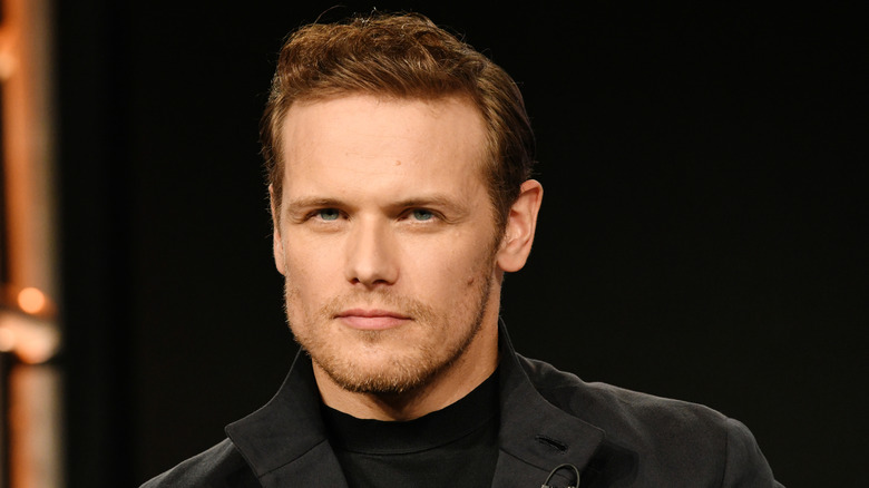 Sam Heughan in all-black outfit