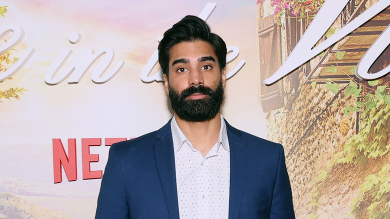Raymond Ablack attending event