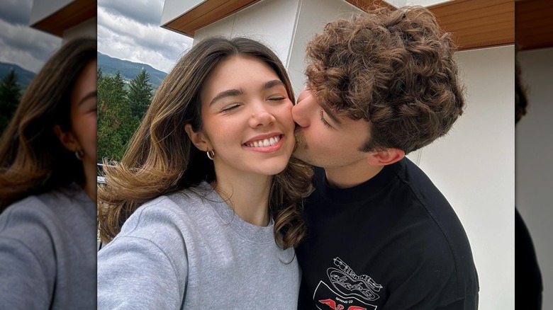 Alisha Newton's boyfriend kissing her on the cheek
