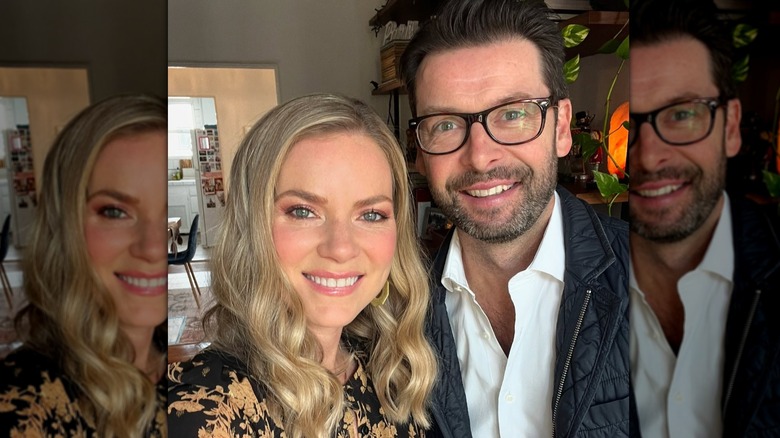 Cindy Busby posing with her husband Chris Boyd