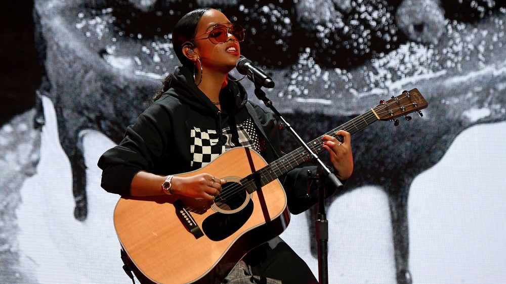 H.E.R. singing