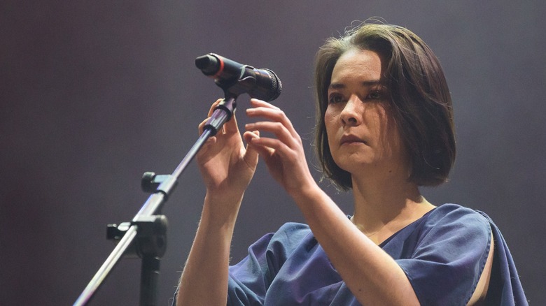 Mitski at a microphone