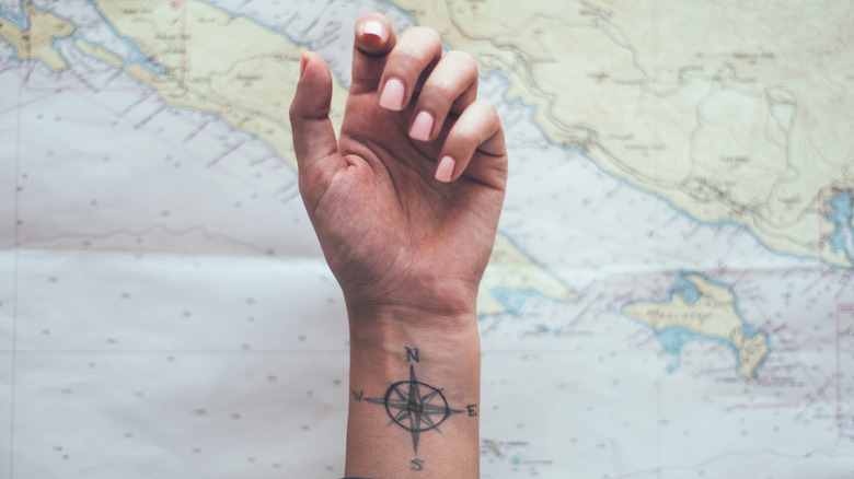 Compass tattoo on wrist 