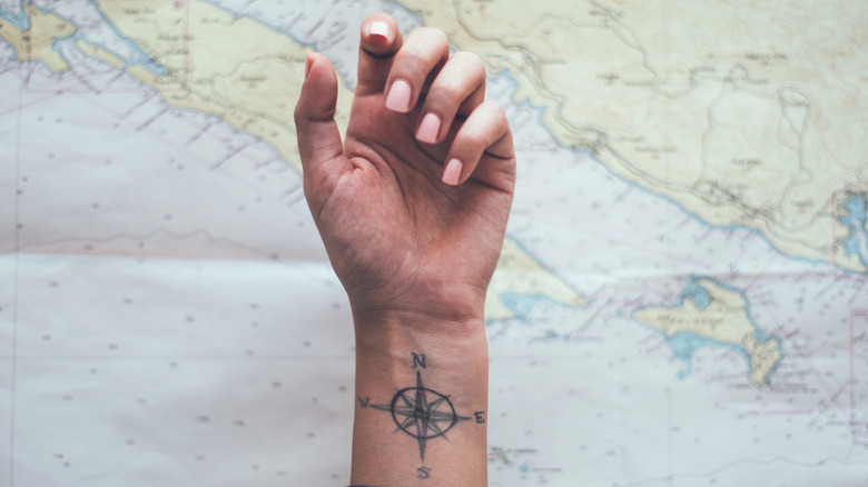 Compass tattoo by Kafka Tattoo  Post 26324  Compass tattoo Compass  tattoos arm Compass tattoo design