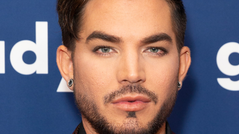 Adam Lambert on a GLAAD carpet in 2018