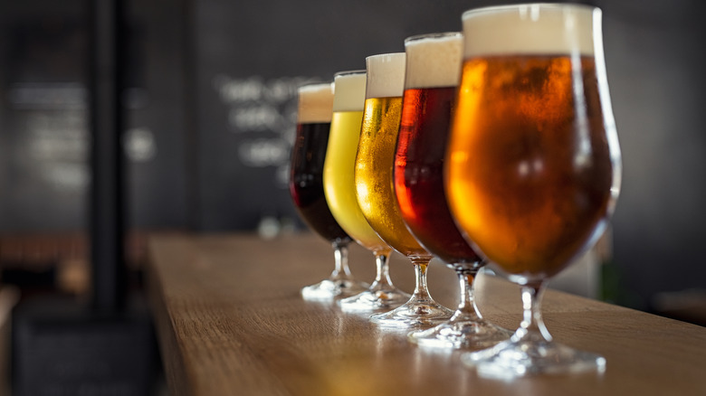 glasses of beer on bar