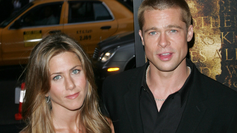Brad Pitt and Jennifer Aniston posing for photos