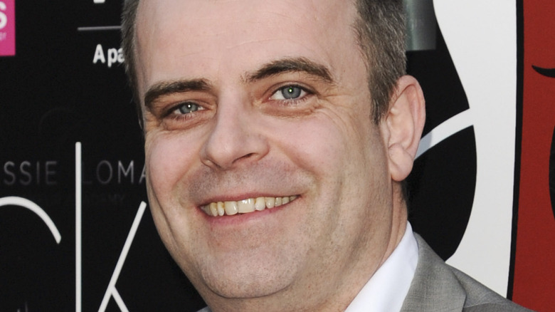 Simon Gregson smiles on the red carpet