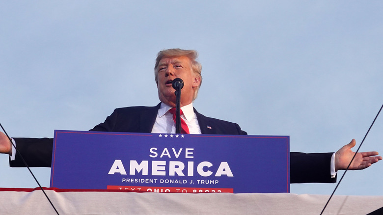 Trump speaking to supporters at a rally
